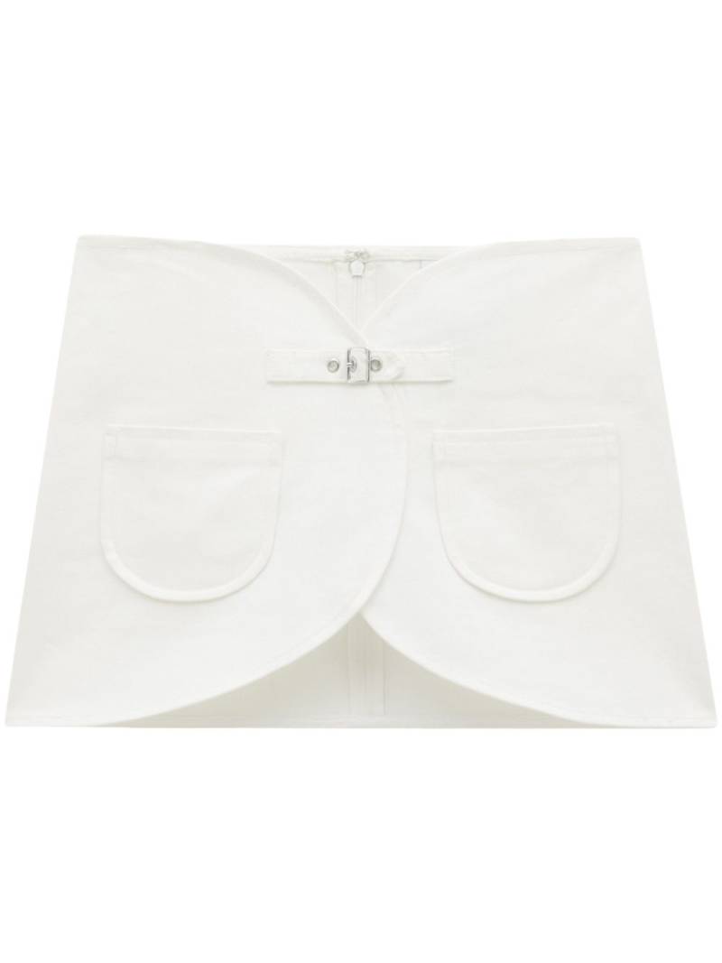 Courrèges Ellipse buckle-strap denim miniskirt - White von Courrèges