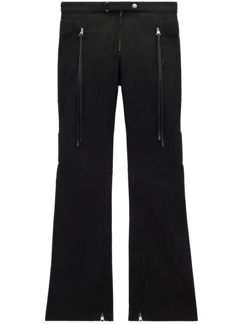 Courrèges Racer flared cotton trousers - Black von Courrèges