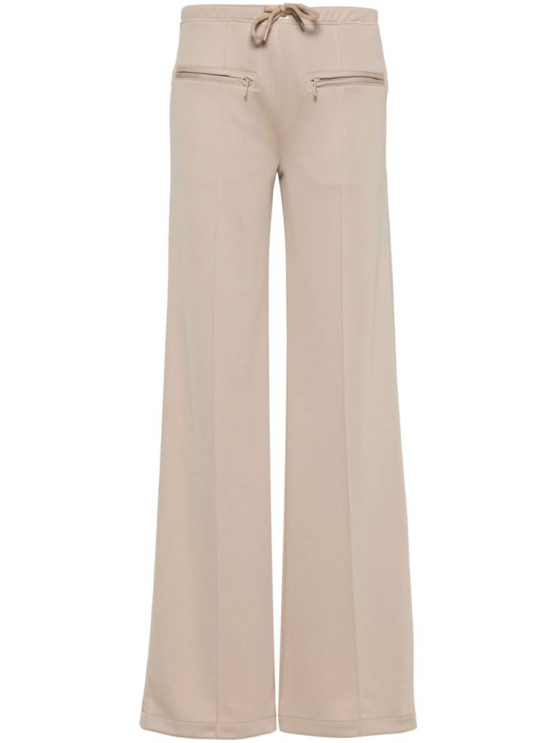 Courrèges logo-patch ribbed trousers - Neutrals von Courrèges