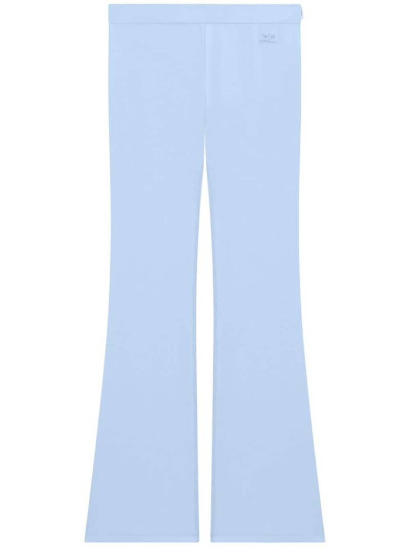 Courrèges tech jersey flared trousers - Blue von Courrèges