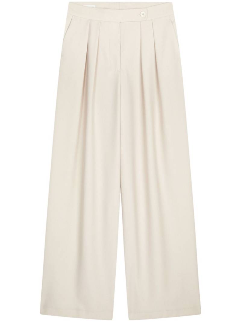 DRIES VAN NOTEN pleated wool palazzo pants - Neutrals von DRIES VAN NOTEN