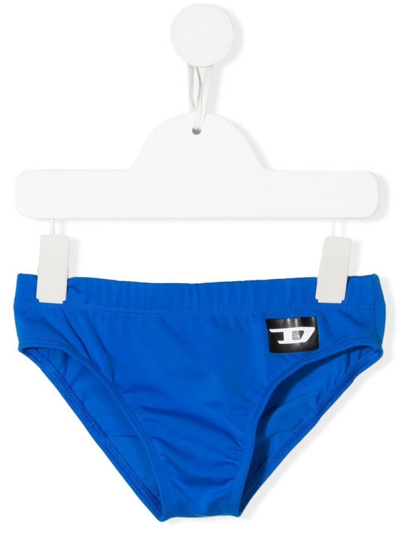 Diesel Kids logo-print detail swim trunks - Blue von Diesel Kids