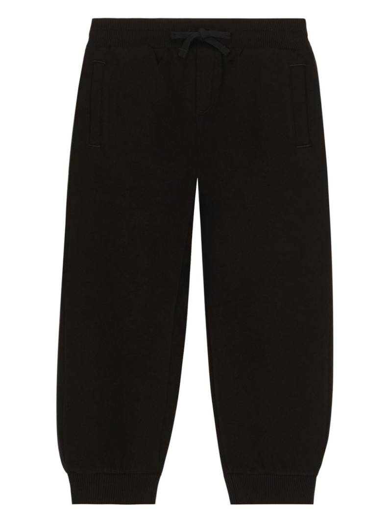 Dolce & Gabbana Kids DG jogo jersey track pants - Black von Dolce & Gabbana Kids