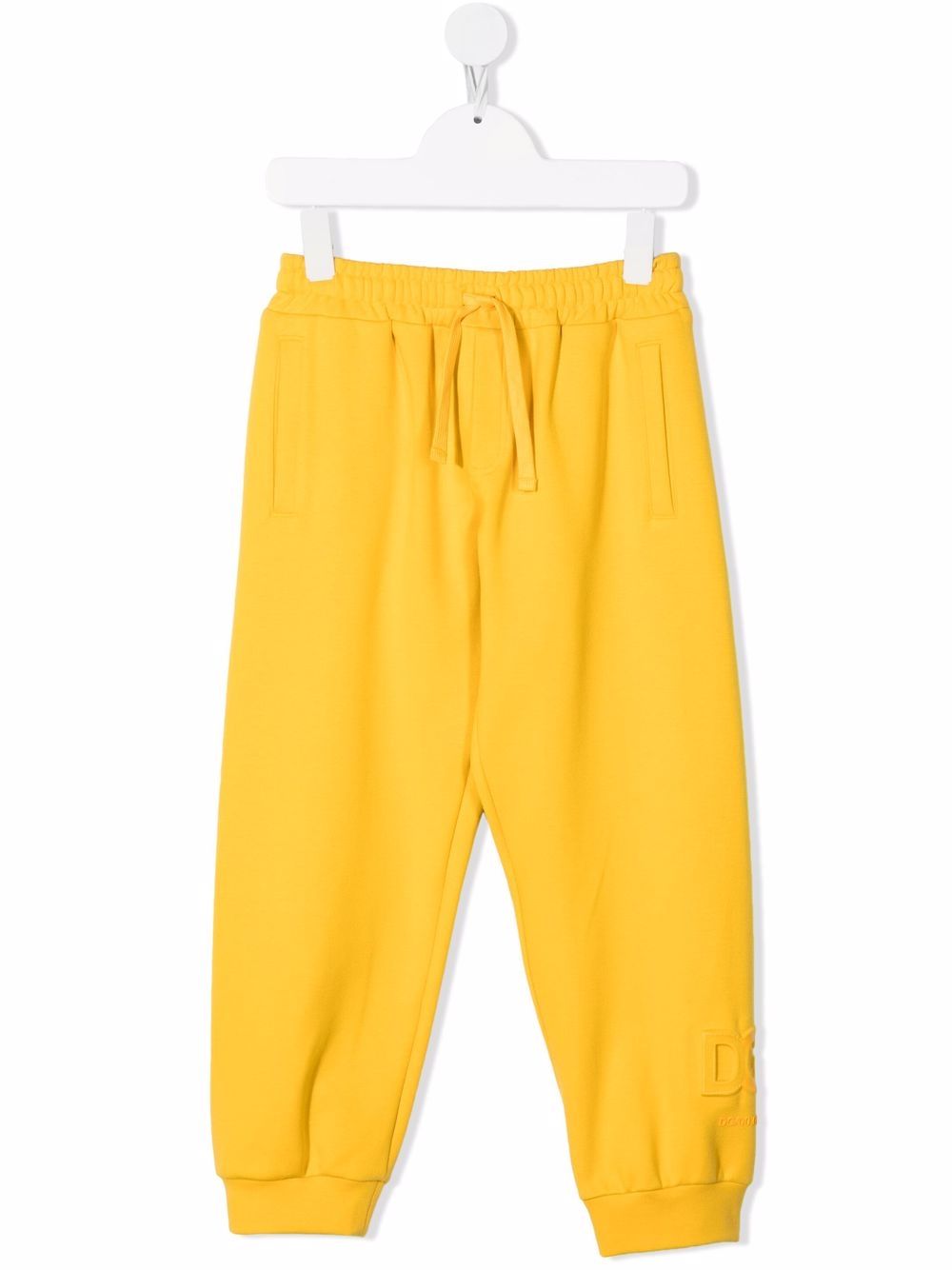 Dolce & Gabbana Kids embossed logo track pants - Yellow von Dolce & Gabbana Kids