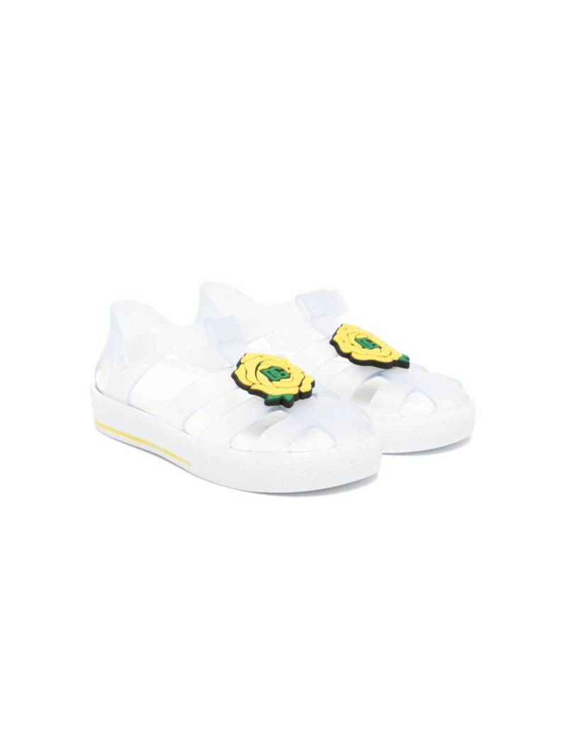 Dolce & Gabbana Kids floral-appliqué jelly shoes - Neutrals von Dolce & Gabbana Kids