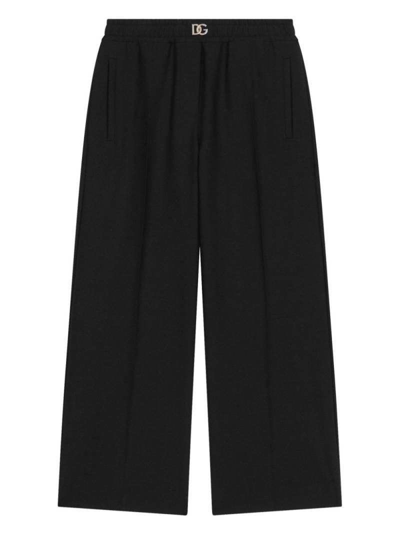 Dolce & Gabbana Kids logo-plaque pleated trousers - Black von Dolce & Gabbana Kids