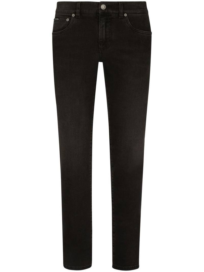 Dolce & Gabbana logo-appliqué skinny jeans - Black von Dolce & Gabbana