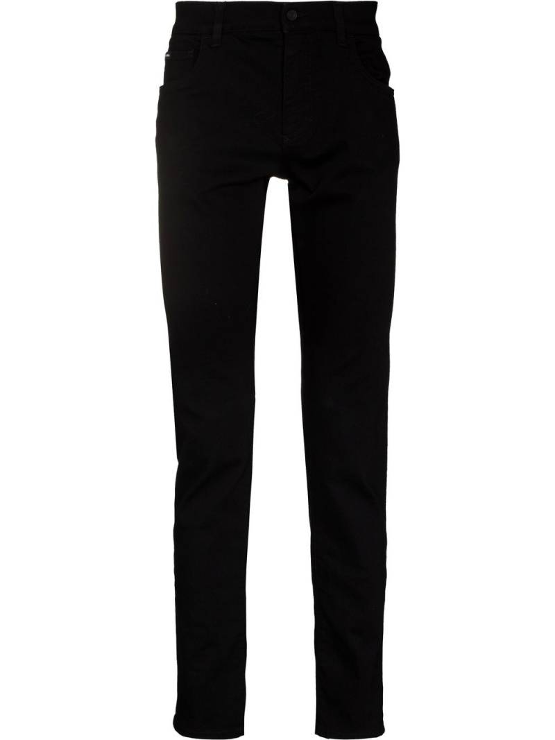 Dolce & Gabbana logo-patch slim-fit jeans - Black von Dolce & Gabbana