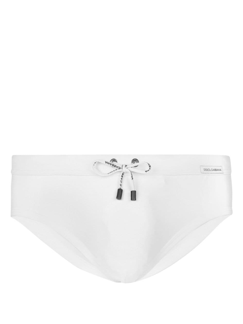 Dolce & Gabbana logo-patch swim trunks - White von Dolce & Gabbana