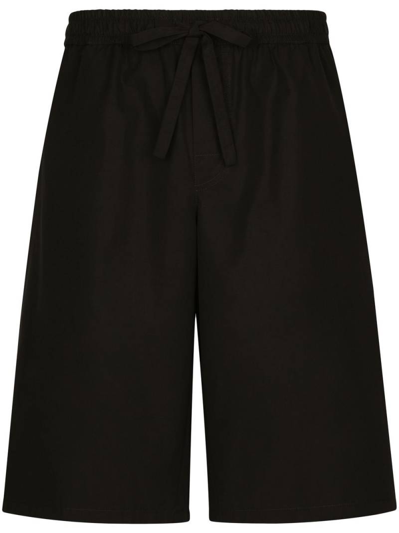 Dolce & Gabbana logo-tag track shorts - Black von Dolce & Gabbana