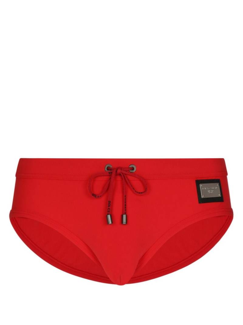 Dolce & Gabbana logo-plaque swim trunks - Red von Dolce & Gabbana