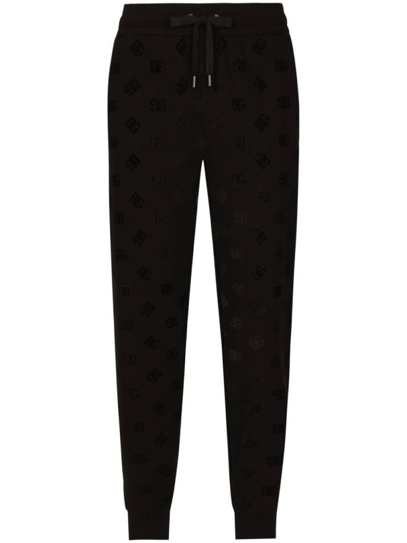 Dolce & Gabbana monogram-embossed cotton track pants - Black von Dolce & Gabbana