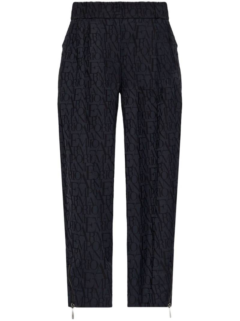 Emporio Armani monogram-print tapered trousers - Black von Emporio Armani