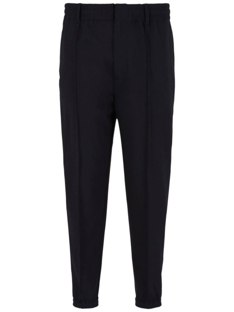 Emporio Armani pressed-crease tapered leg trousers - Black von Emporio Armani