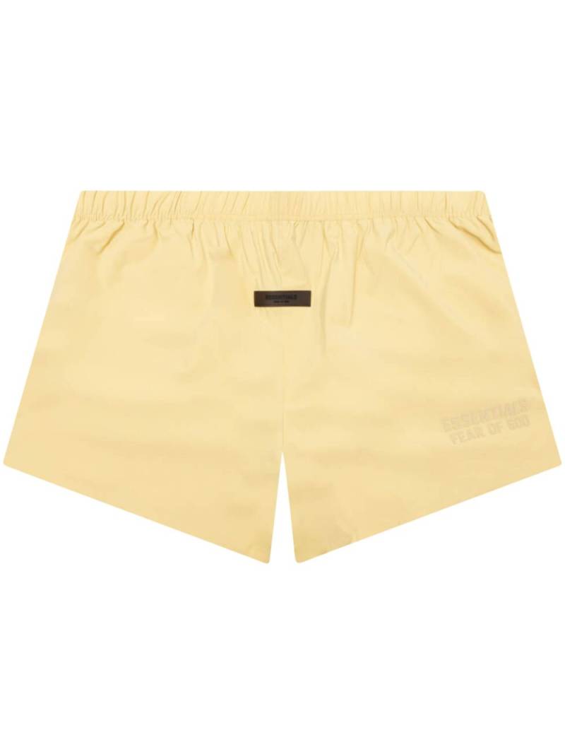 FEAR OF GOD ESSENTIALS logo-appliqué running shorts - Yellow von FEAR OF GOD ESSENTIALS