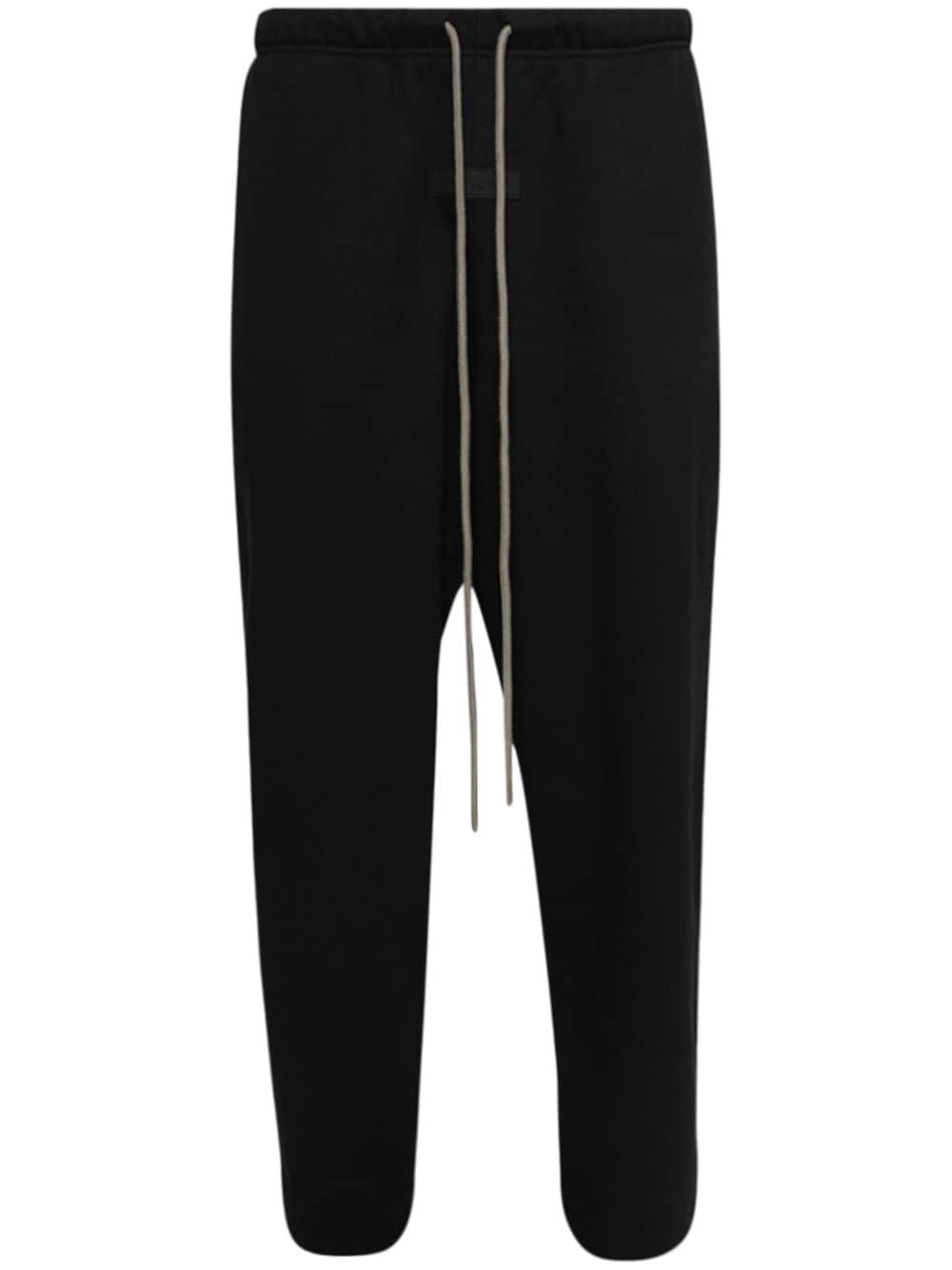 FEAR OF GOD ESSENTIALS logo-appliquéd lounge track pants - Black von FEAR OF GOD ESSENTIALS