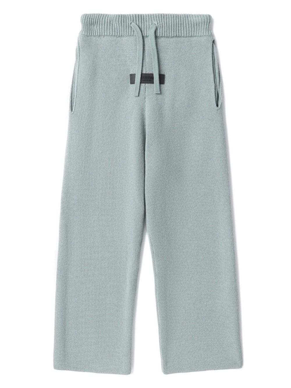 FEAR OF GOD ESSENTIALS logo-patch straight-leg trousers - Grey von FEAR OF GOD ESSENTIALS