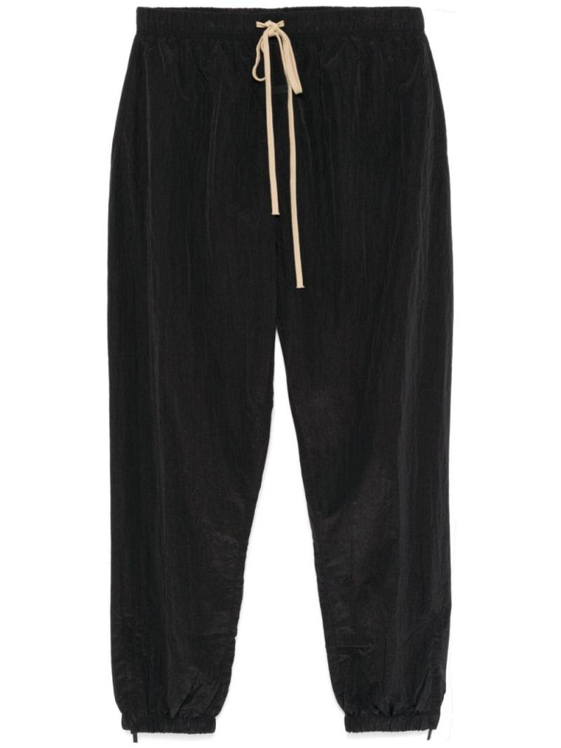 FEAR OF GOD ESSENTIALS ripstop track pants - Black von FEAR OF GOD ESSENTIALS