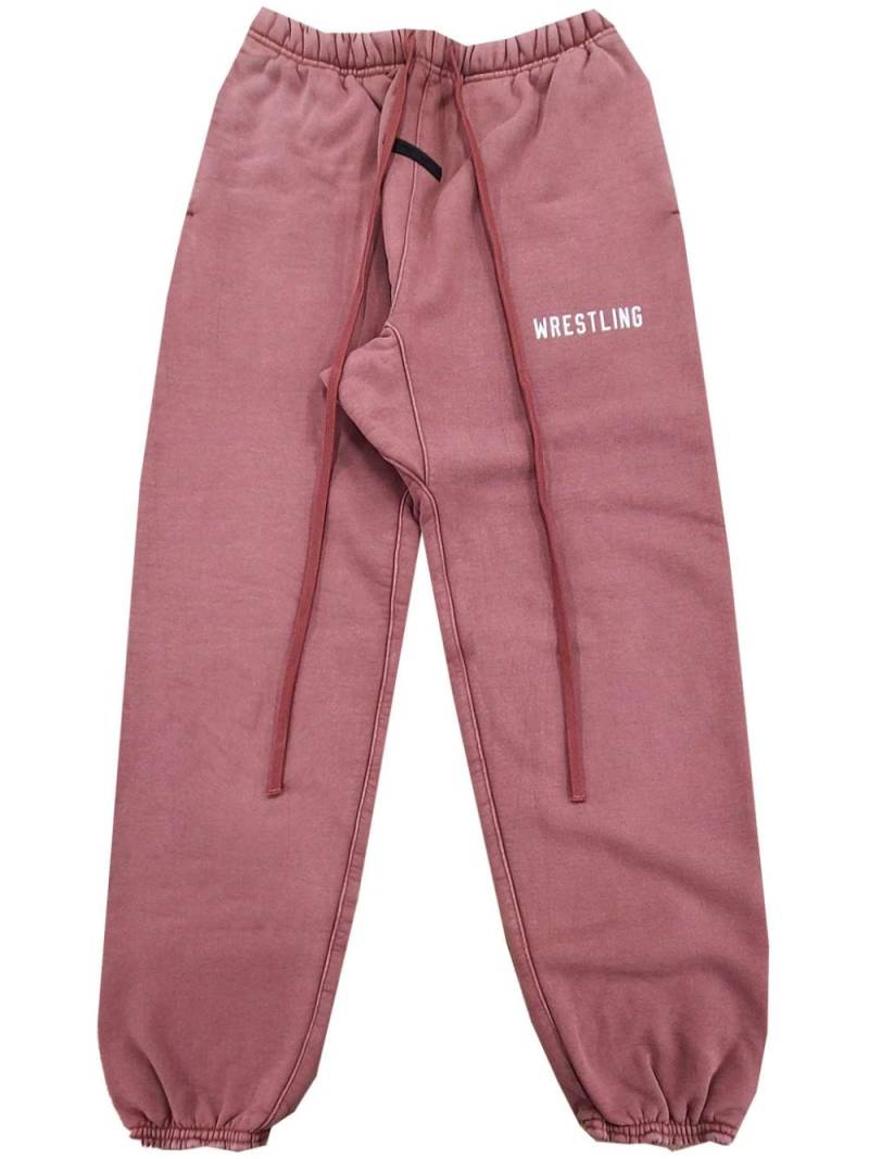 FEAR OF GOD ESSENTIALS slogan-print track pants - Pink von FEAR OF GOD ESSENTIALS