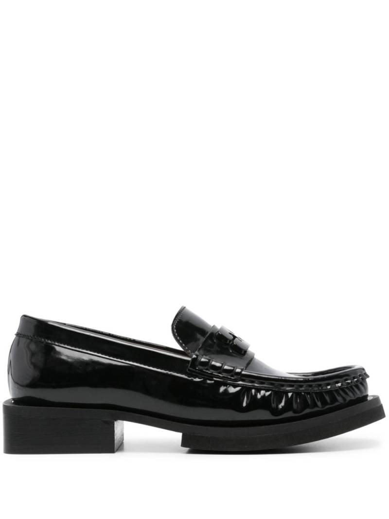 GANNI logo-plaque loafers - Black von GANNI