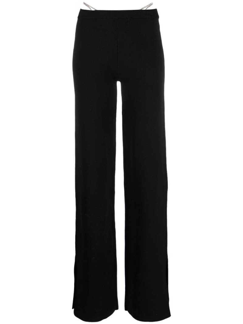 GCDS crystal-thong flared trousers - Black von GCDS