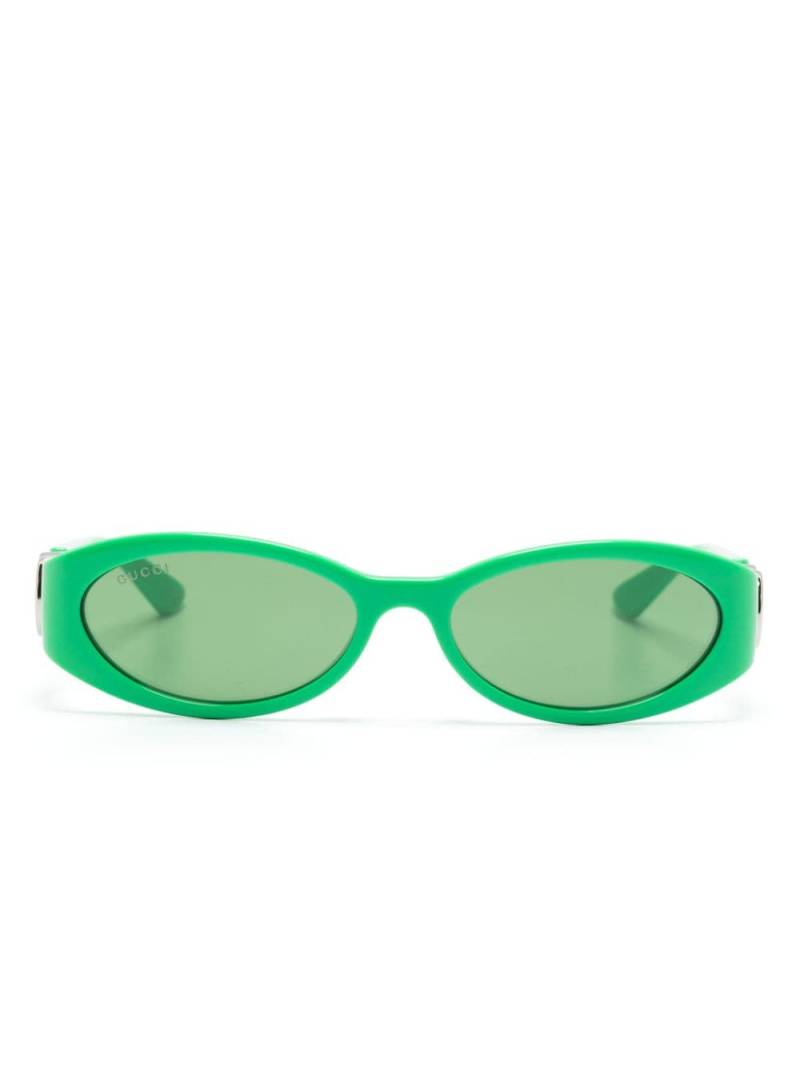 Gucci Eyewear Interlocking G oval-frame sunglasses - Green von Gucci Eyewear