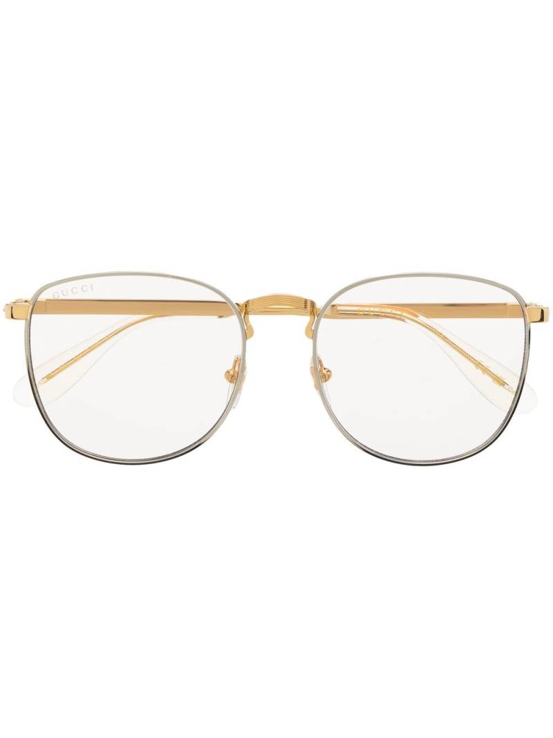 Gucci Eyewear logo-engraved round-frame glasses - Gold von Gucci Eyewear