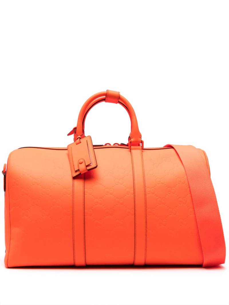 Gucci medium GG rubber-effect duffle bag - Orange von Gucci