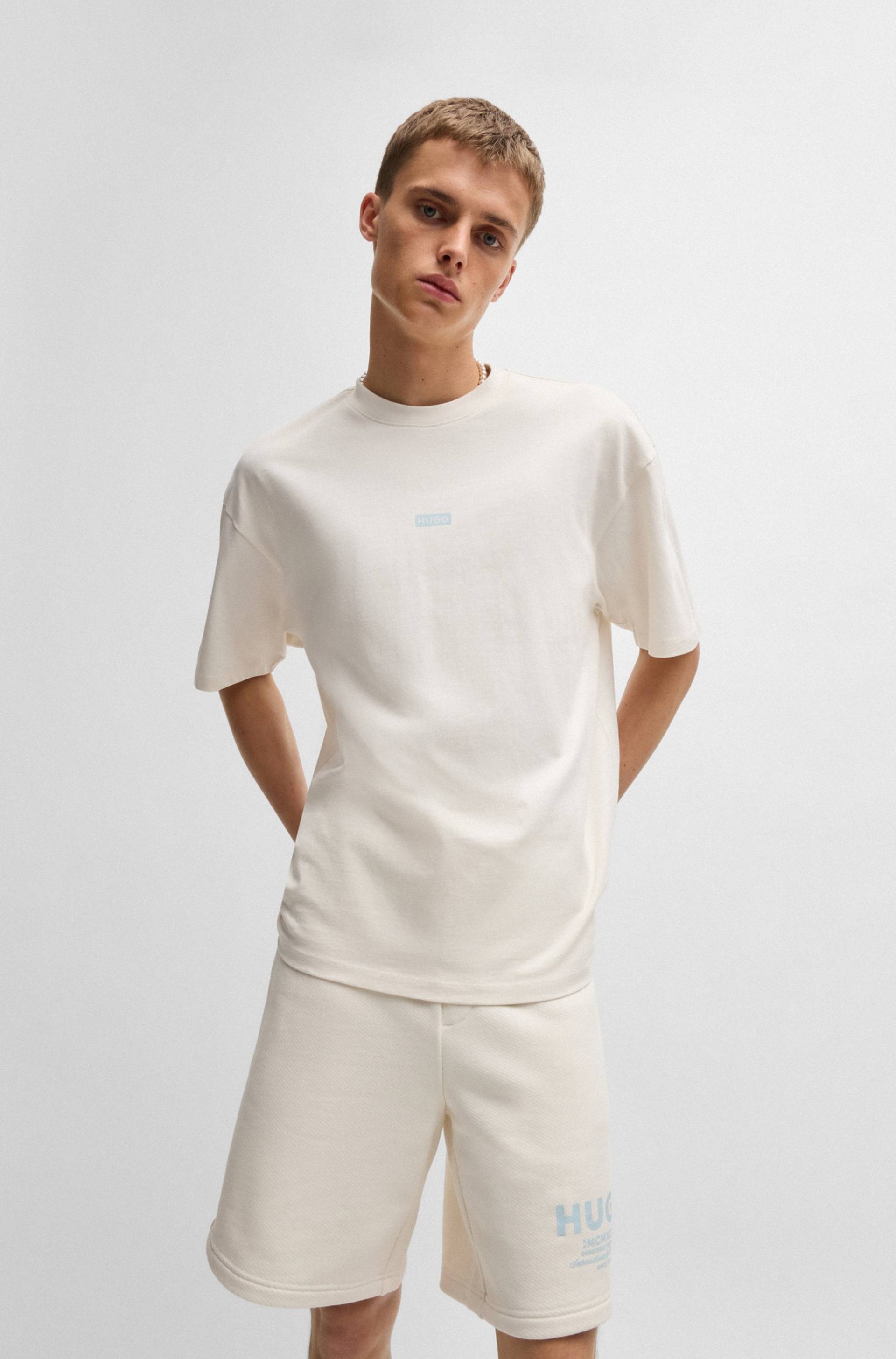 HUGO Blue T-Shirt »Nalono«, mit Logodruck, Oversized Look mit Backprint HUGO Blue T-Shirt »Nalono«, mit Logodruck, Oversized Look mit Backprint von HUGO Blue
