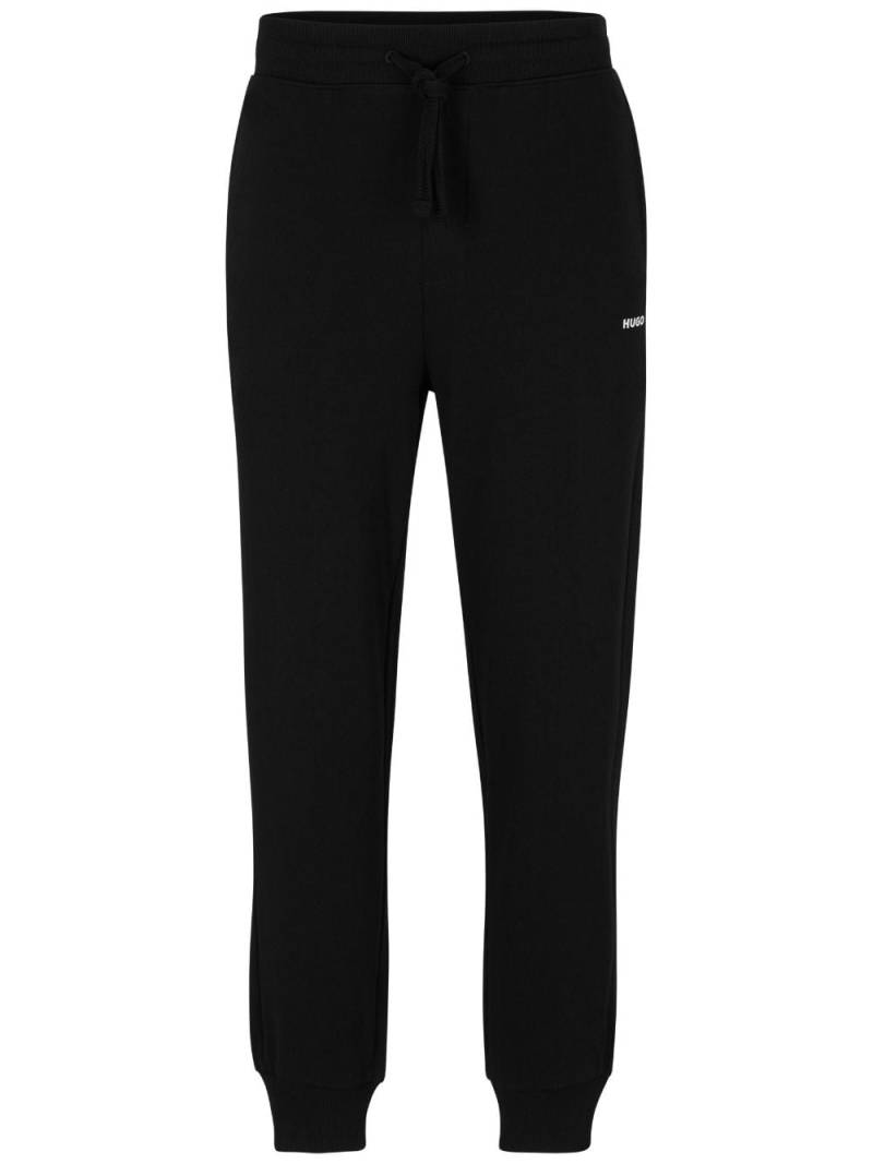 HUGO logo-print cotton track pants - Black von HUGO