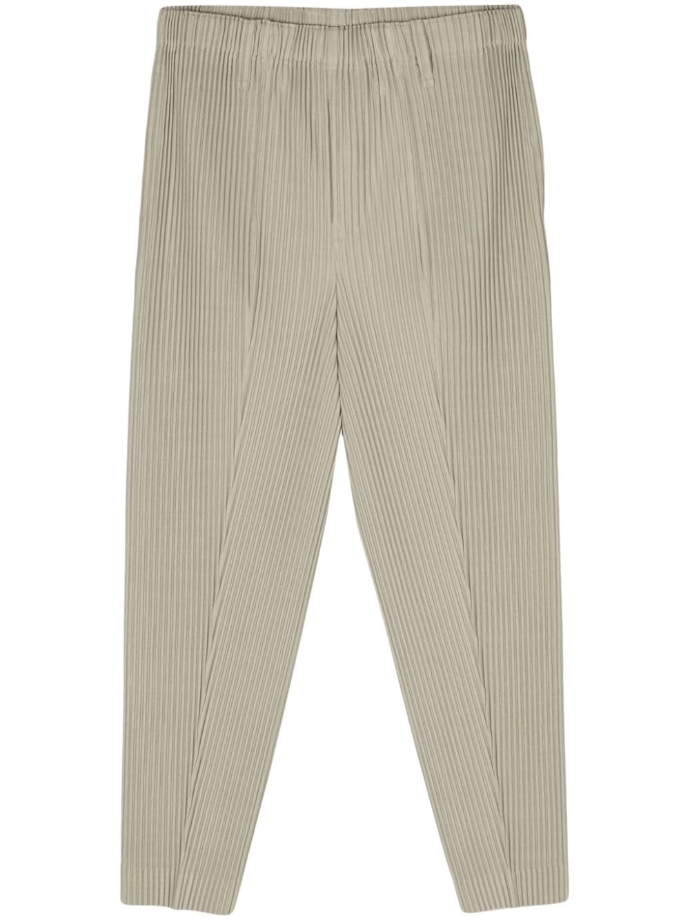 Homme Plissé Issey Miyake Compleat tapered-leg trousers - Green von Homme Plissé Issey Miyake