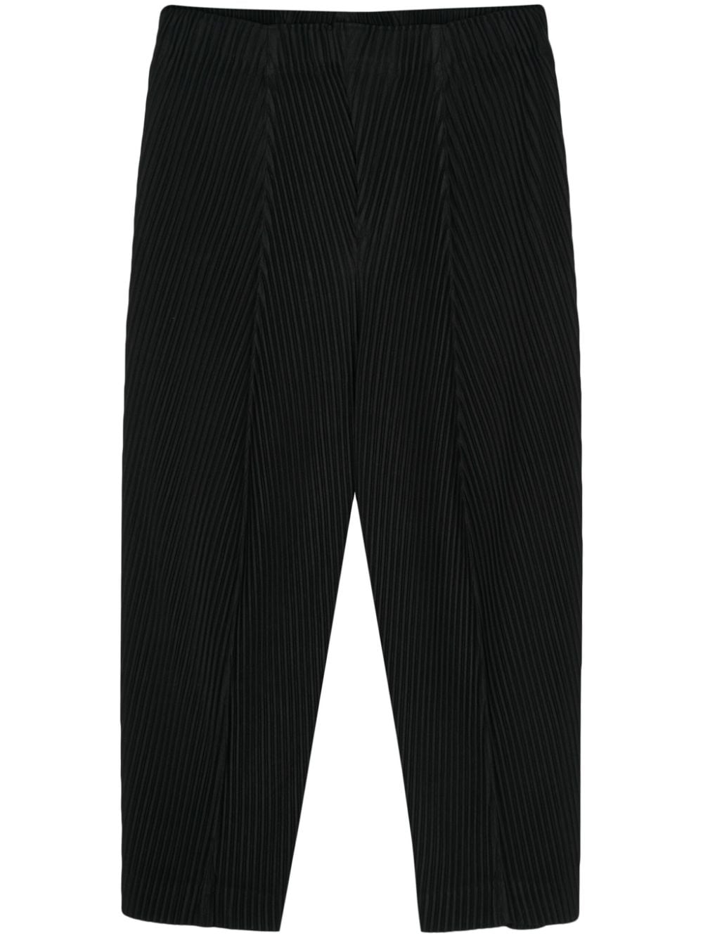 Homme Plissé Issey Miyake pleated straight-leg cropped trousers - Black von Homme Plissé Issey Miyake