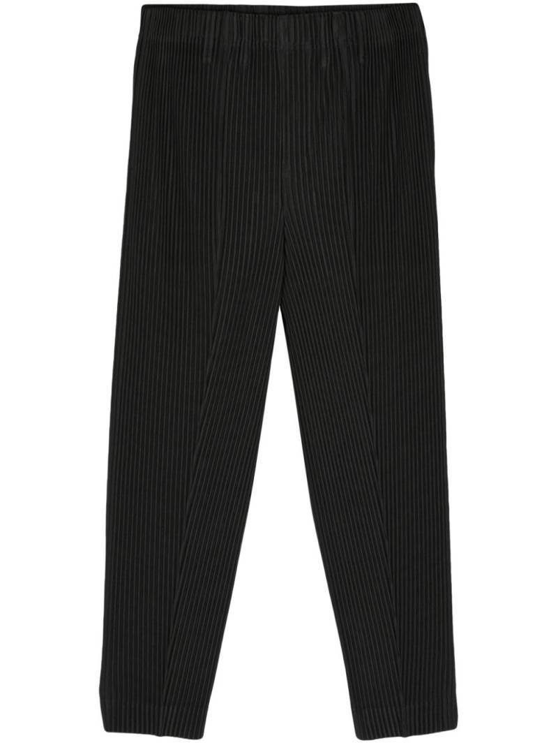 Homme Plissé Issey Miyake plissé cropped trousers - Black von Homme Plissé Issey Miyake