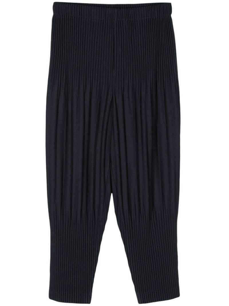 Homme Plissé Issey Miyake plissé-effect trousers - Blue von Homme Plissé Issey Miyake