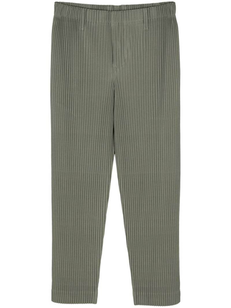 Homme Plissé Issey Miyake tapered-leg plissé trousers - Green von Homme Plissé Issey Miyake