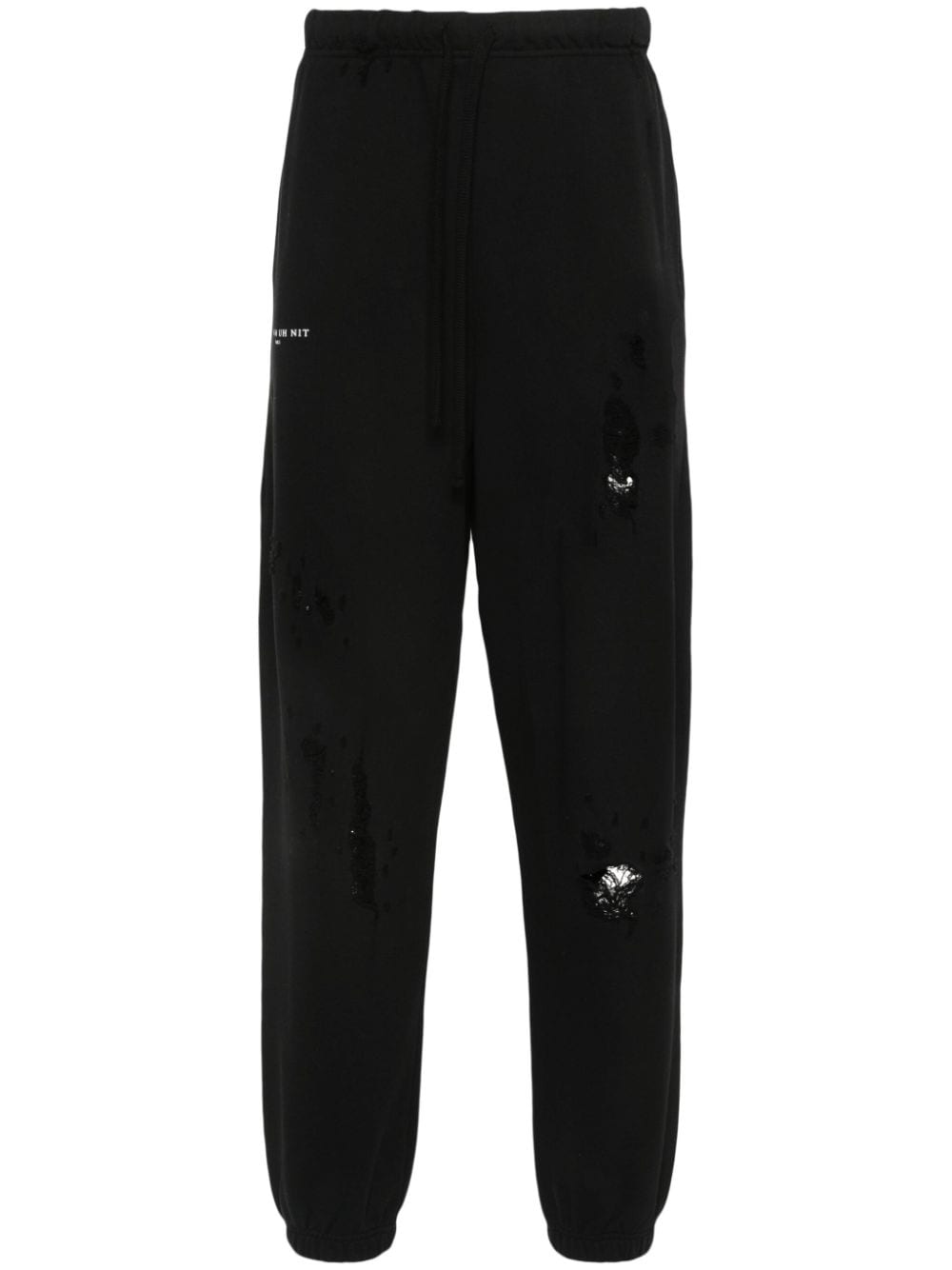 Ih Nom Uh Nit logo-print distressed track pants - Black von Ih Nom Uh Nit