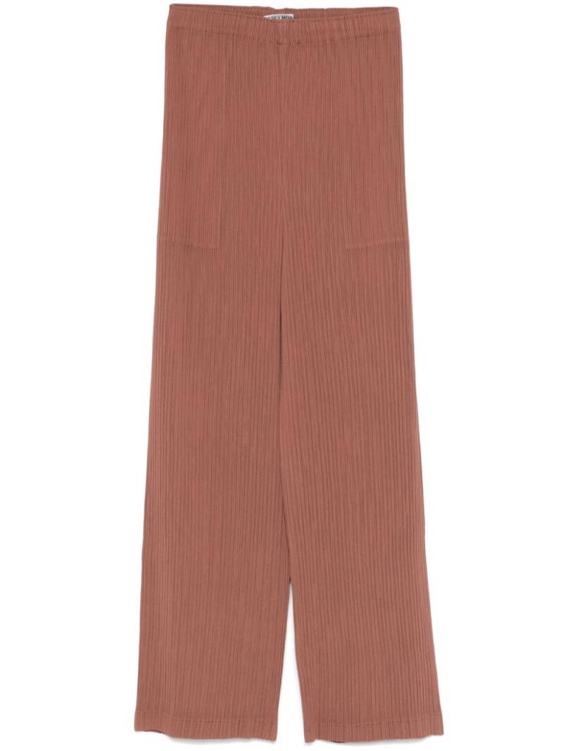 Issey Miyake Hatching Pleats trousers - Brown von Issey Miyake