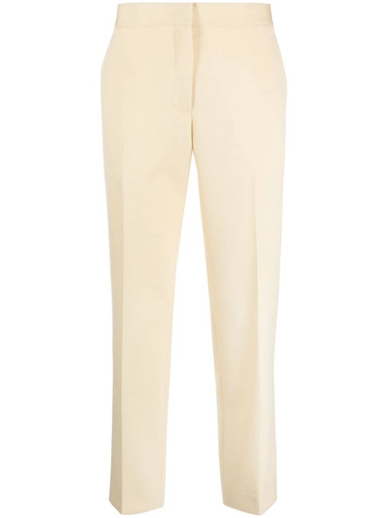 Jil Sander pressed-crease wool slim-fit trousers - Yellow von Jil Sander