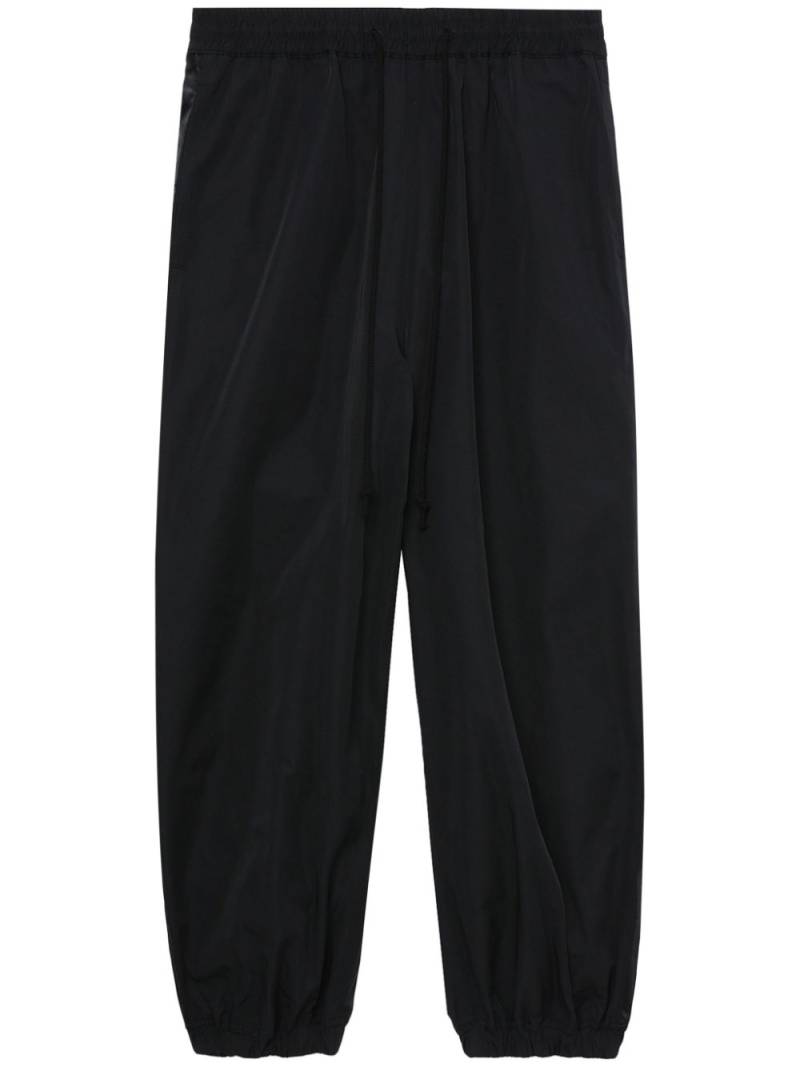 Junya Watanabe MAN panelled tapered trousers - Black von Junya Watanabe MAN