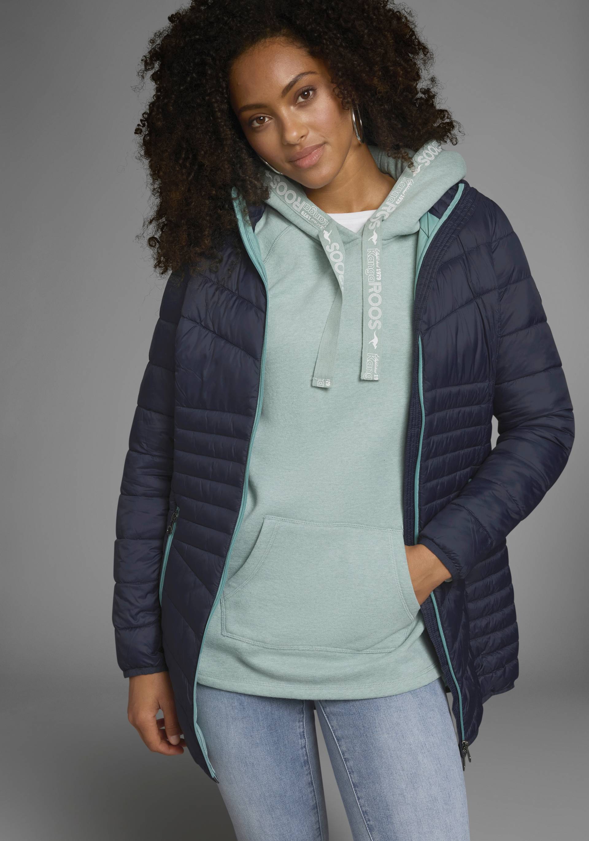 KangaROOS Steppjacke, mit Kapuze, für den Übergang, aus leichtem Webmaterial, figurbetonter Schnitt KangaROOS Steppjacke, mit Kapuze, für den Übergang, aus leichtem Webmaterial, figurbetonter Schnitt von KangaROOS