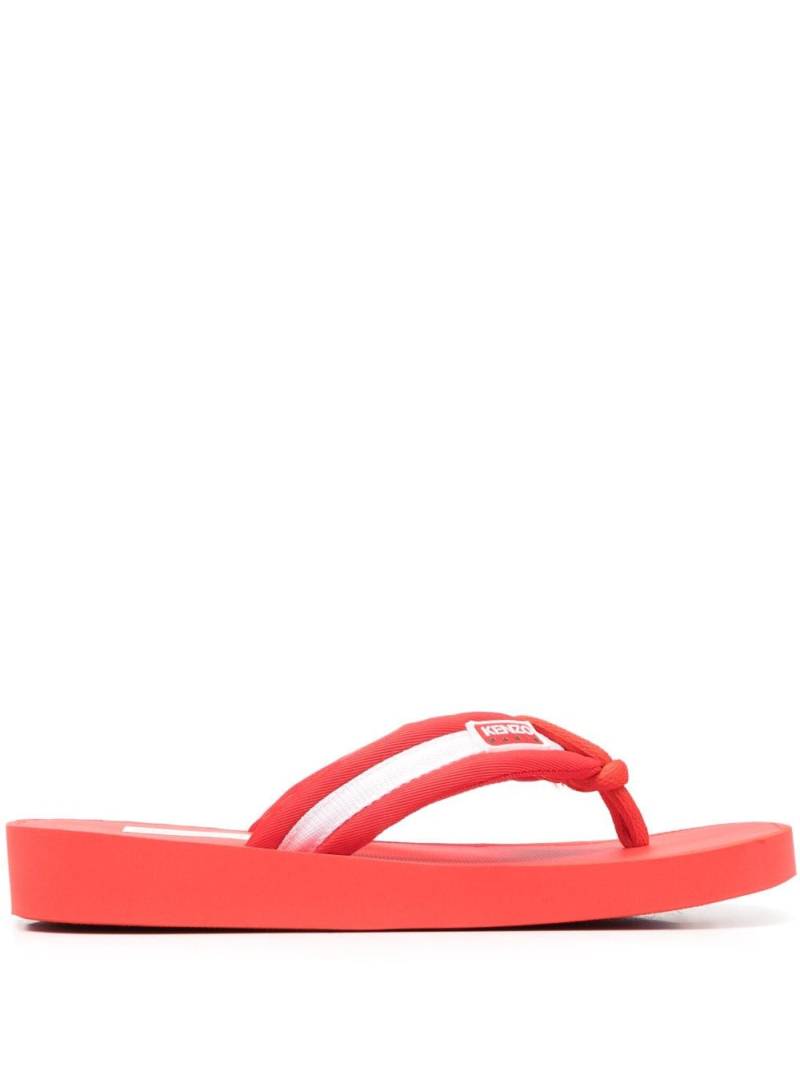 Kenzo logo-patch striped flip flops - Red von Kenzo