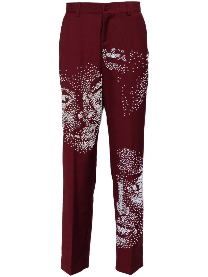 KidSuper embellished-faces trousers - Red von KidSuper