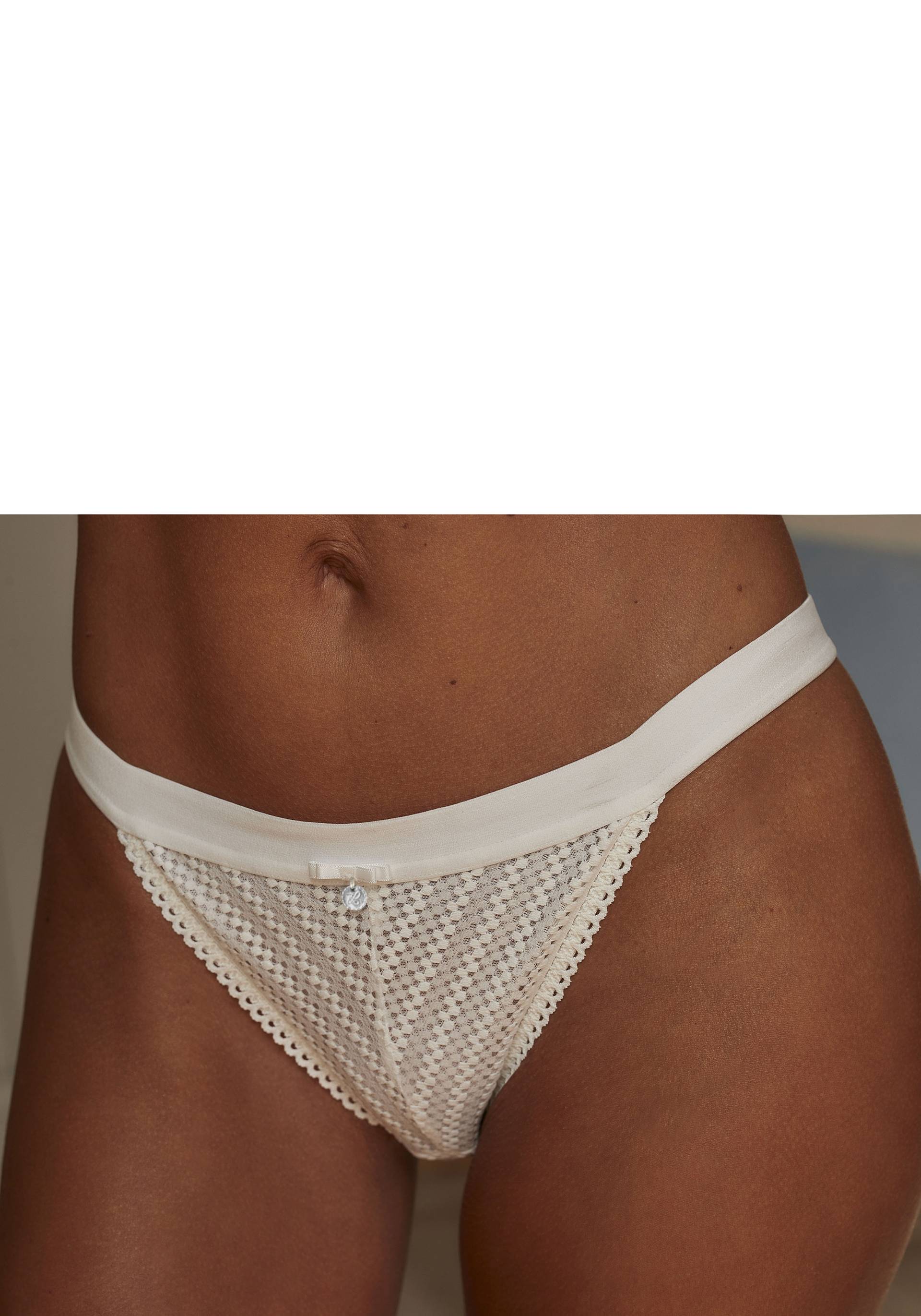 LASCANA Tanga, mit breitem, elastischen Bund und Spitze von LASCANA