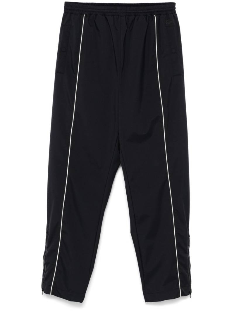 Lacoste piped-trim trousers - Black von Lacoste