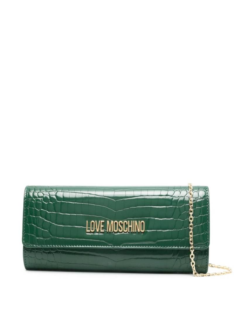 Love Moschino crocodile-embossed logo clutch bag - Green von Love Moschino