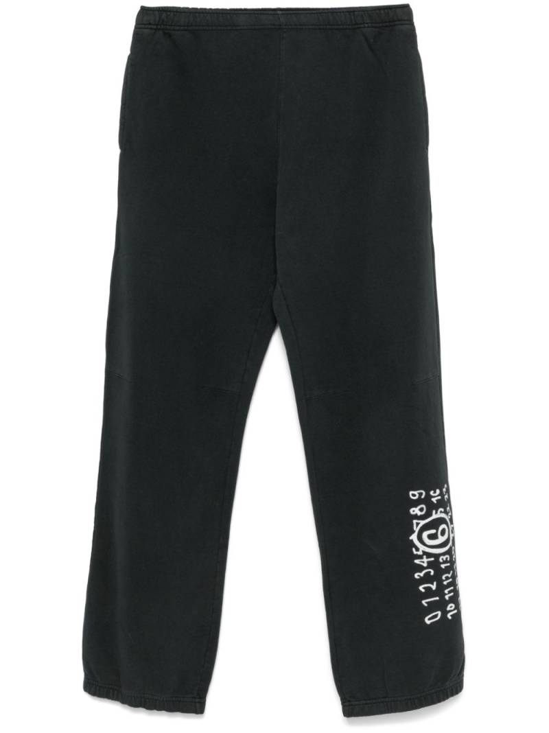 MM6 Maison Margiela numbers motif-print track trousers - Black von MM6 Maison Margiela