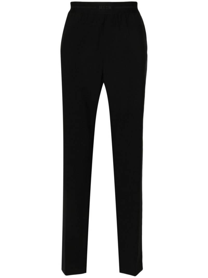 MSGM logo-waistband tapered trousers - Black von MSGM