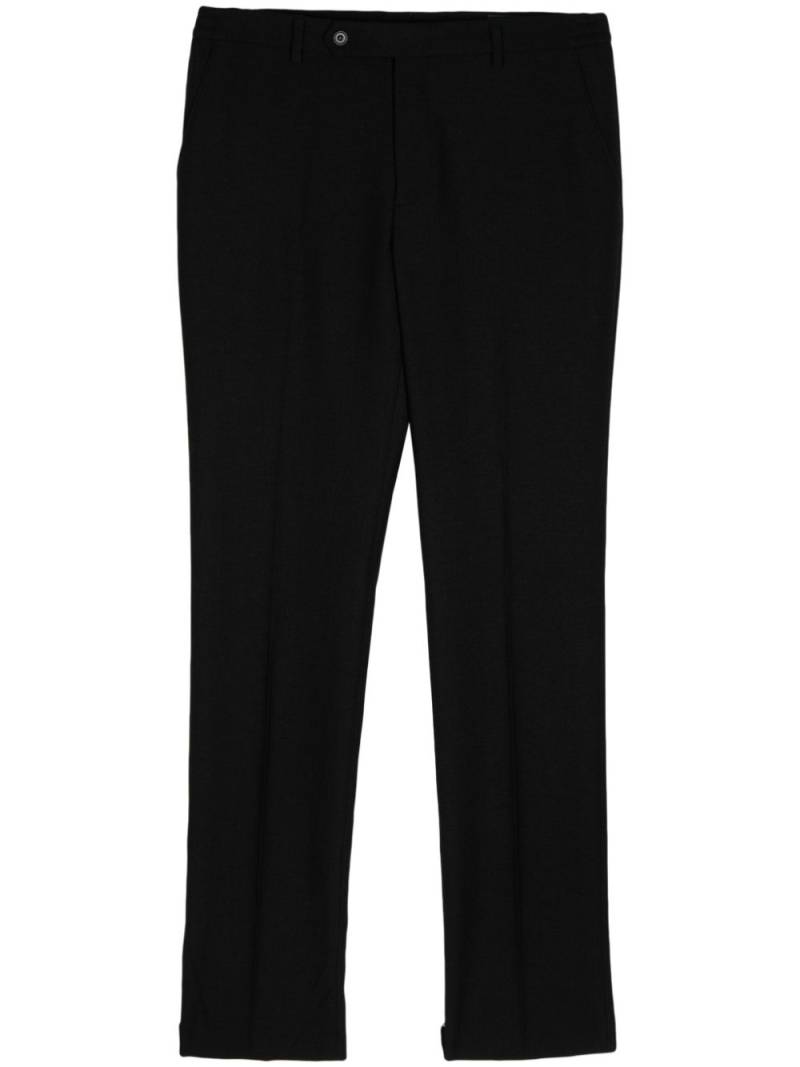 Man On The Boon. tapered cropped trousers - Black von Man On The Boon.