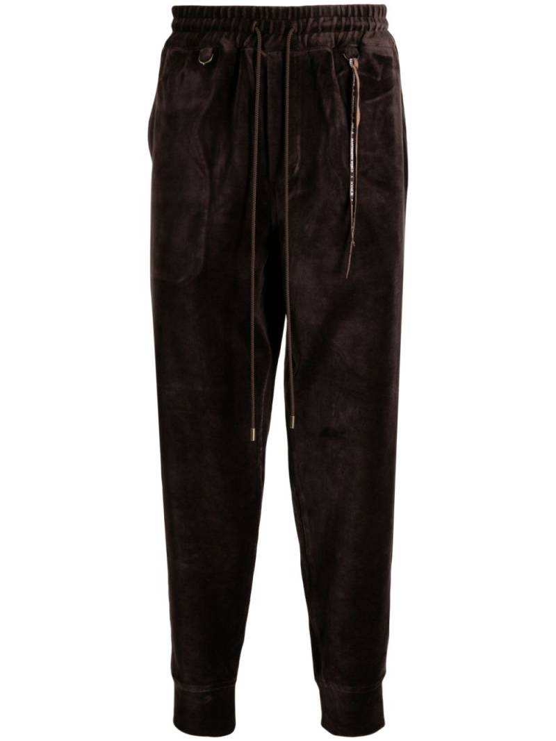 Mastermind World tapered velour track pants - Brown von Mastermind World