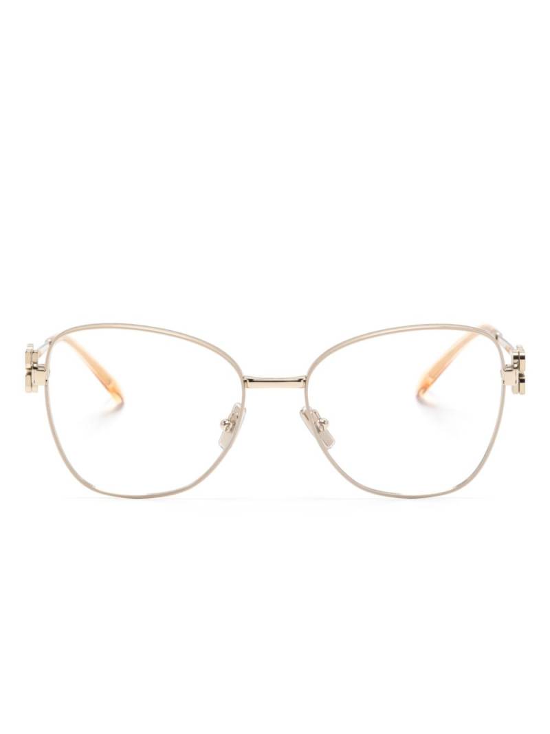 Miu Miu Eyewear logo-plaque glasses - Gold von Miu Miu Eyewear